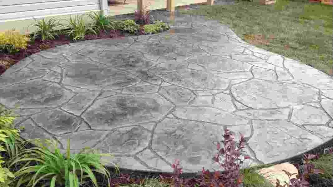 Stamped concrete in arizona flagstone pattern in a patio setting in Thornton, Colorado