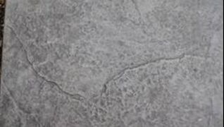 A seamless old granite stamped concrete pattern taken in Thornton, Colorado